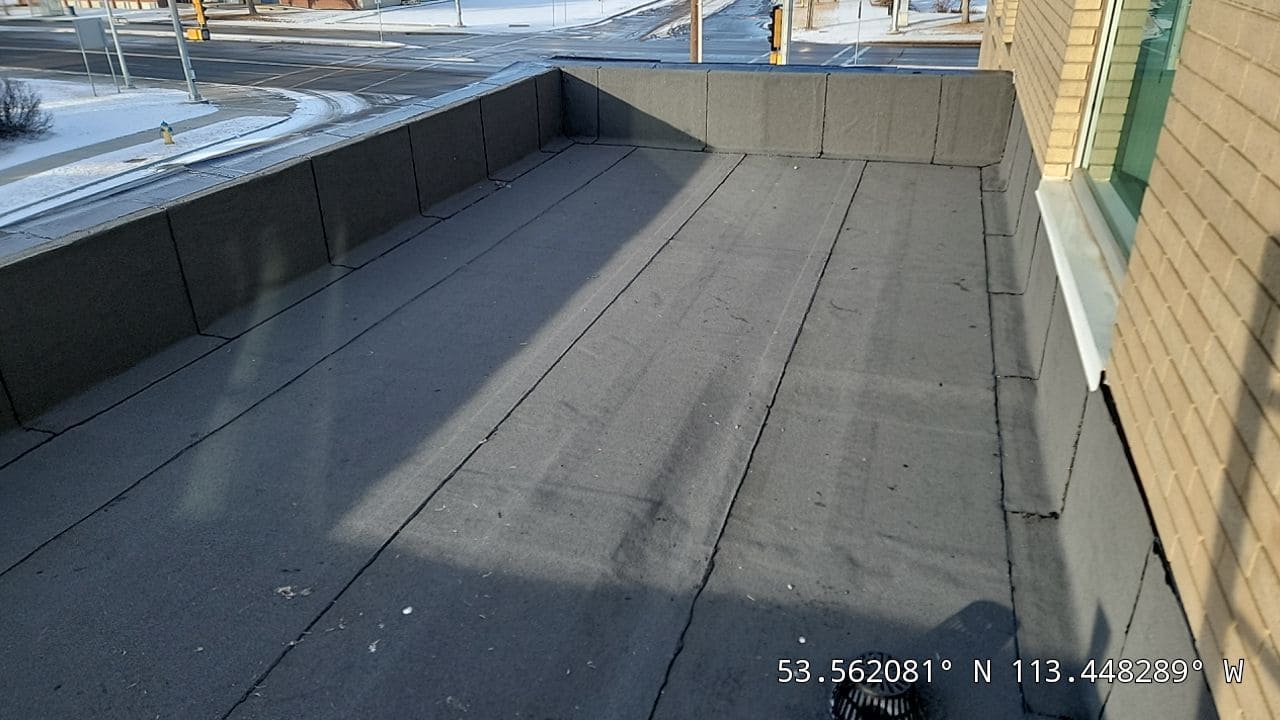 New 2-ply SBS roof system installed