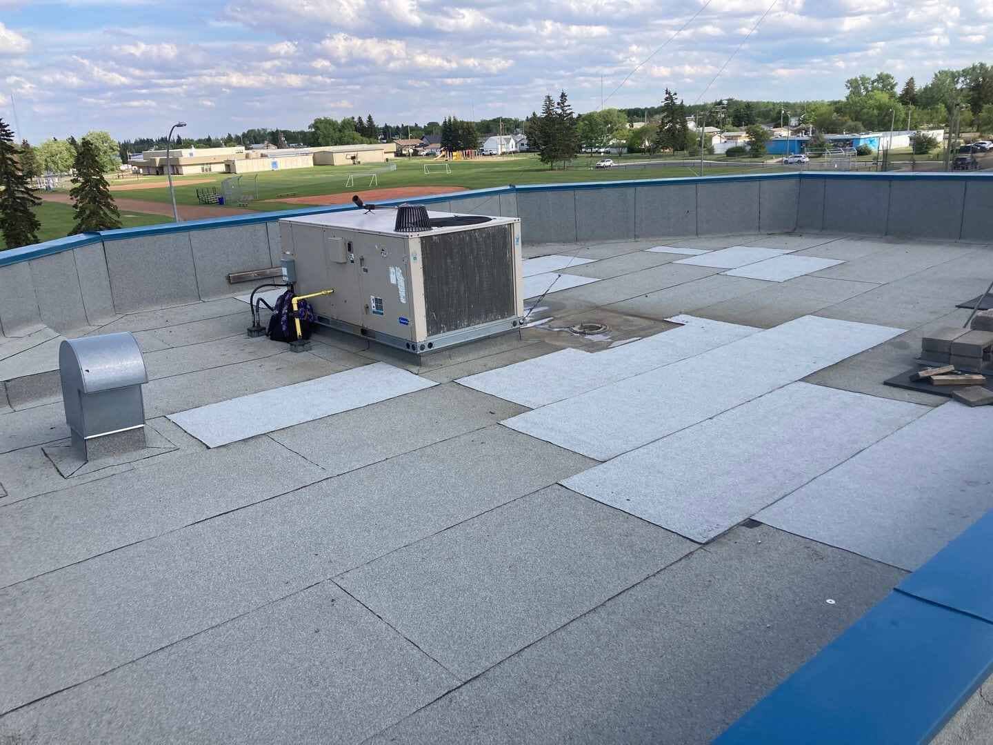 SBS Flat Roofing Repairs at Pembina Place 4944 53 St - Redwater