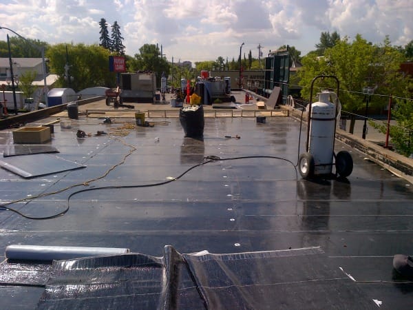 3 New SBS roof being installed